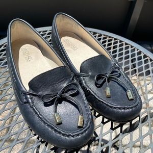 Michael Kors black leather loafer with gold accent